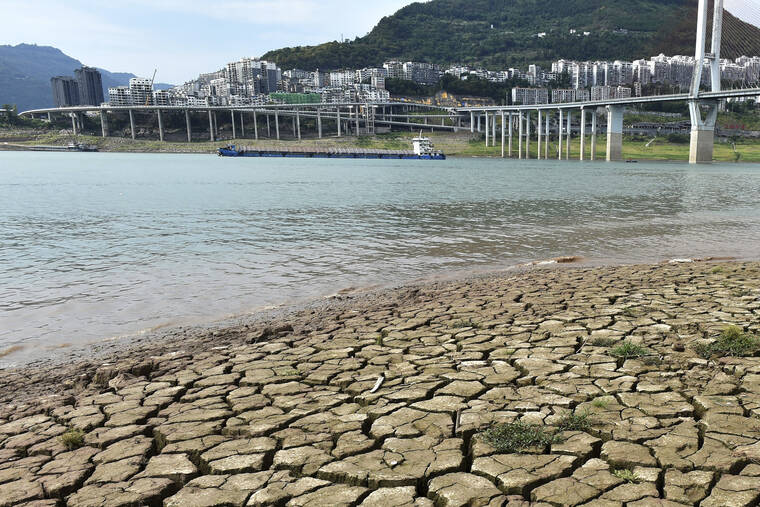 CHINATOPIX VIA AP
                                A dried riverbed is exposed after the water level dropped in the Yangtze River in Yunyang county in southwest China’s Chongqing Municipality.