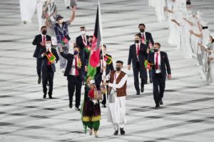 ASSOCIATED PRESS
                                Kimia Yousofi, front left, and Farzad Mansouri, of Afghanistan, carry their country’s flag during the opening ceremony in the Olympic Stadium at the 2020 Summer Olympics on July 23, 2021, in Tokyo.