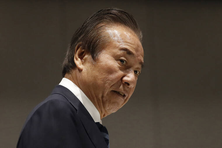 ISSEI KATO/POOL PHOTO VIA ASSOCIATED PRESS
                                Haruyuki Takahashi, executive board member of the Tokyo Organizing Committee of the Olympic and Paralympic Games arrives at Tokyo 2020 Executive Board Meeting in Tokyo in March 2020. Japanese prosecutors arrested Takahashi and three employees of a clothing company on bribery charges Wednesday.