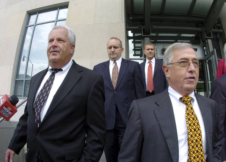 MARK MORAN/THE CITIZENS’ VOICE VIA ASSOCIATED PRESS
                                Former Luzerne County Court Judges Michael Conahan, front left, and Mark Ciavarella, front right, leave the United States District Courthouse, in September 2009, in Scranton, Pa. The two Pennsylvania judges who orchestrated a scheme to send children to for-profit jails in exchange for kickbacks were ordered to pay more than $200 million to hundreds of children who fell victim to their crimes.
