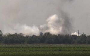 RU-RTR RUSSIAN TELEVISION / AP / AUG. 16
                                In this image taken from video provided by the RU-RTR Russian television, smoke rises over the site of explosion at an ammunition storage of Russian army near the village of Mayskoye, Crimea.