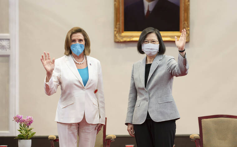 TAIWAN PRESIDENTIAL OFFICE / AP / AUG. 3
                                U.S. House Speaker Nancy Pelosi, left, and Taiwan’s President Tsai Ing-wen wave during a meeting in Taipei, Taiwan.