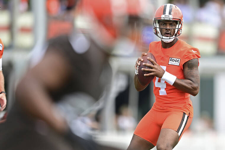 ASSOCIATED PRESS
                                Cleveland Browns quarterback Deshaun Watson looks to throw during NFL football practice in Berea, Ohio, Tuesday.
