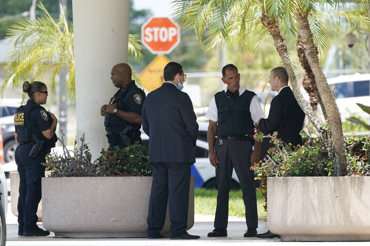 ASSOCIATED PRESS
                                Law enforcement stands outside of the Paul G. Rogers Federal Courthouse, today, in West Palm Beach, Fla. Attorneys for the nation’s largest media companies are presenting their case before a federal magistrate judge to make public the affidavit supporting the warrant that allowed FBI agents to search former President Donald Trump’s Mar-a-Lago estate in Florida.