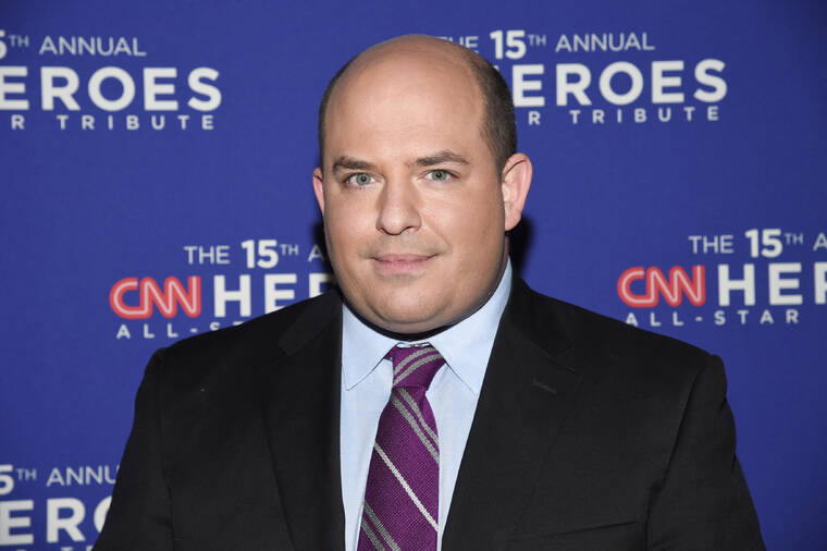 EVAN AGOSTINI/INVISION/ASSOCIATED PRESS
                                Brian Stelter attends the 15th annual CNN Heroes All-Star Tribute in New York on Dec. 12, 2021. CNN says it has canceled its weekly program on the media, ‘Reliable Sources,’ and host Brian Stelter will be leaving the network.