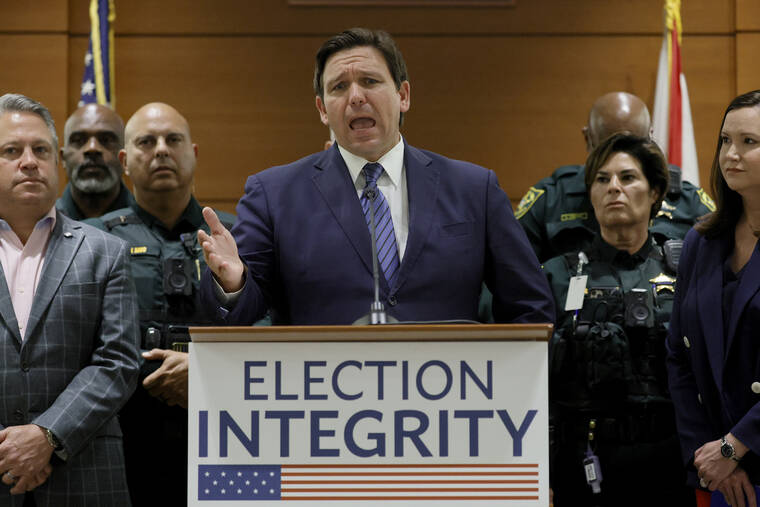 SOUTH FLORIDA SUN-SENTINEL / AP
                                Florida Gov. Ron DeSantis speaks during a news conference at the Broward County Courthouse in Fort Lauderdale, Fla. on Thursday, Aug. 18.