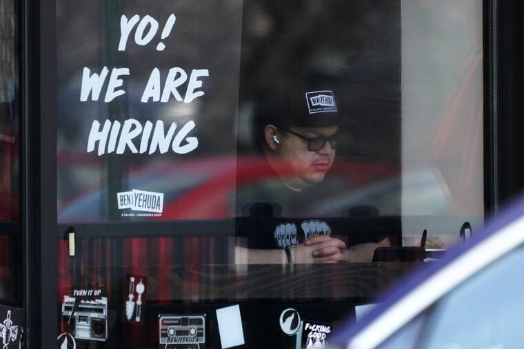 ASSOCIATED PRESS / APRIL 1
                                A hiring sign is displayed at a restaurant in Schaumburg, Ill. More Americans applied for jobless benefits last week, reported Thursday, Aug. 4, 2022, as the number of unemployed continues to rise modestly, though the labor market remains one of the strongest parts of the U.S. economy.