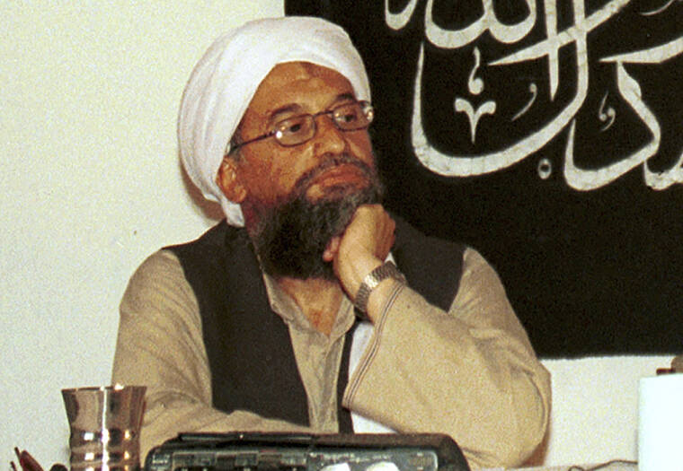 ASSOCIATED PRESS / 1998
                                In this 1998 file photo made available in 2004, Ayman al-Zawahri, holds a press conference with Osama bin Laden (not seen) in Khost, Afghanistan.