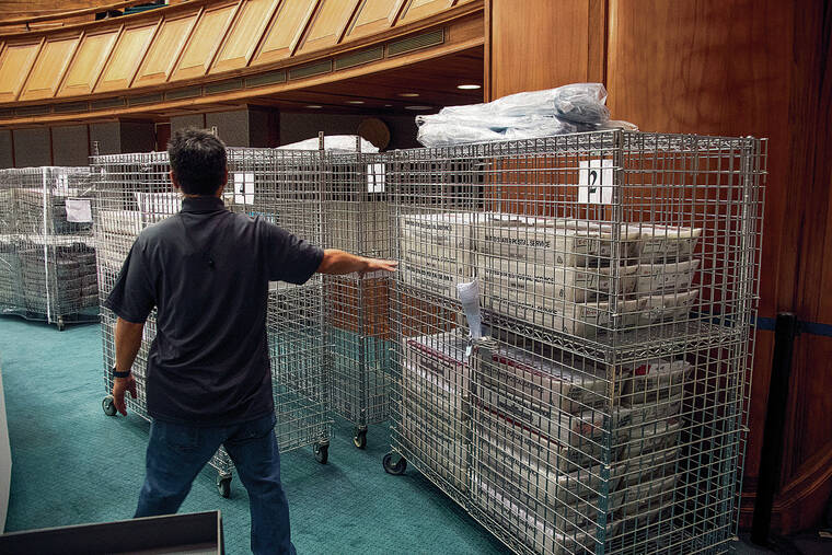 CRAIG T. KOJIMA / CKOJIMA@STARADVERTISER.COM
                                Ballots for Hawaii’s primary election were stored at the state Capitol prior to being processed.