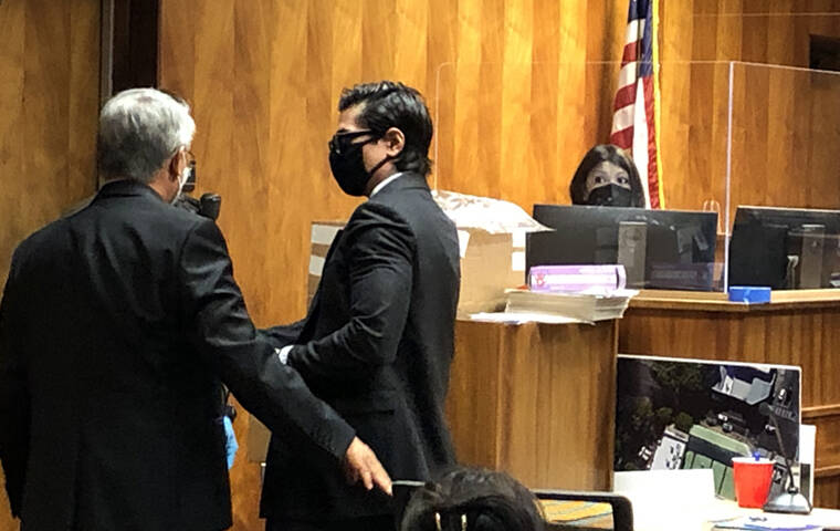 LEILA FUJIMORI / LFUJIMORI@STARADVERTISER.COM
                                Casey Asato is taken into custody after being found guilty of arson, reckless endangering and multiple counts of terroristic threatening, Thursday, Aug. 11, in Honolulu.