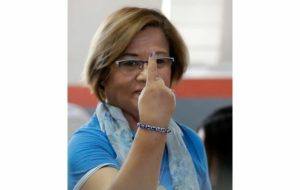 ASSOCIATED PRESS
                                Philippines Opposition Senator Leila de Lima shows the indelible ink on her forefinger, proof that she has voted, after casting her ballot in the country’s midterm elections, in May 2019, in suburban Paranaque southeast of Manila, Philippines.