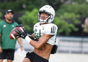 STEVEN ERLER / SPECIAL TO THE STAR-ADVERTISER 
                                Warriors wide receiver Chuuky Hines caught a pass during a fall camp practice at the Ching Complex on July 30.