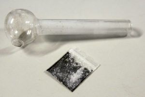 ASSOCIATED PRESS
                                A pouch containing crystalized methamphetamine and a homemade pipe is seen.