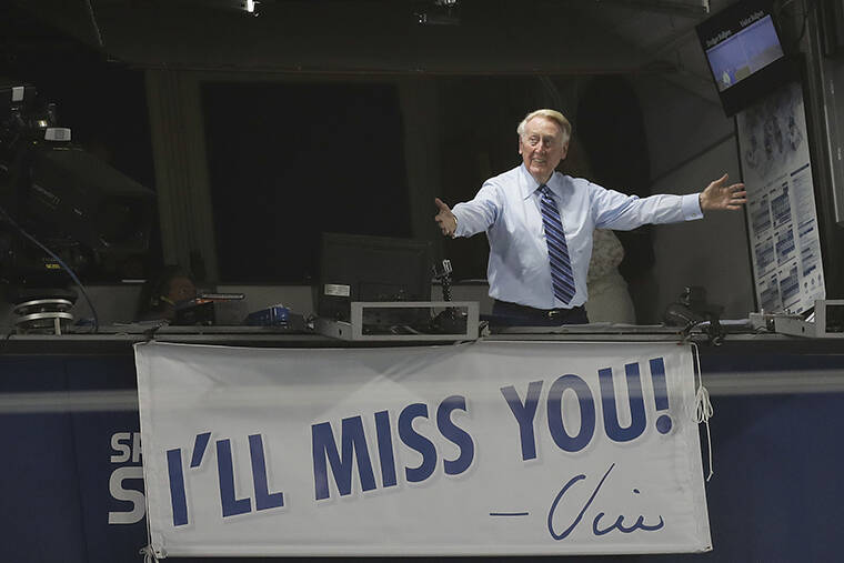 ASSOCIATED PRESS
                                Los Angeles Dodgers broadcaster Vin Scully gestures in his booth during a baseball game between the Los Angeles Dodgers and the Colorado Rockies, Sept. 23, 2016, in Los Angeles, two days before his final game from Dodger Stadium.