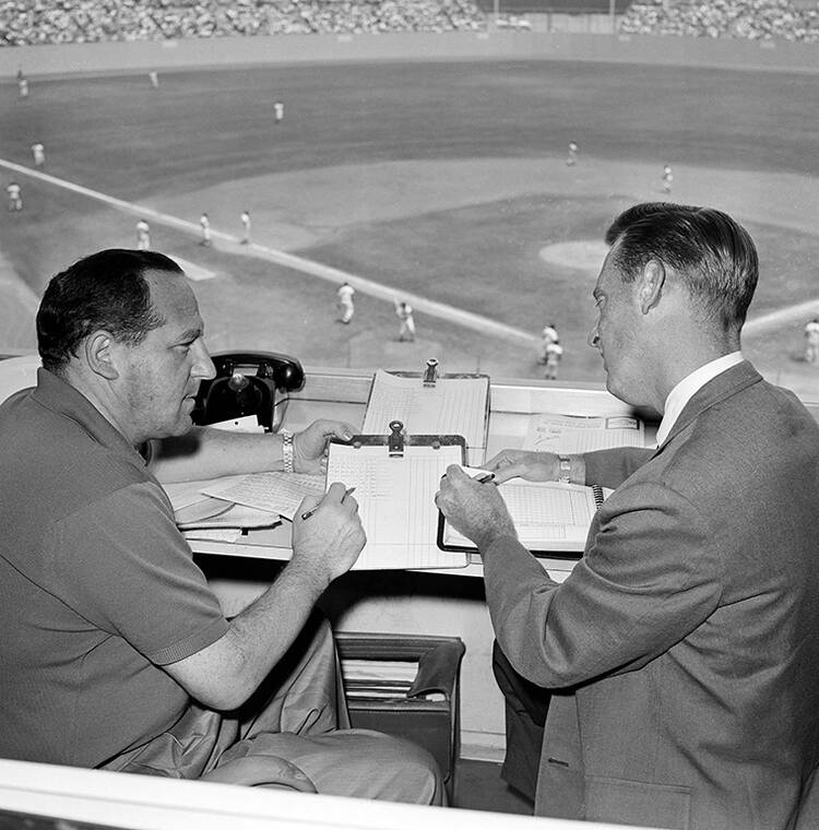 ASSOCIATED PRESS
                                Allan Roth, left, statistician of the Los Angeles Dodgers, sits in the booth with broadcaster Vin Scully in August 1963 in Los Angeles.