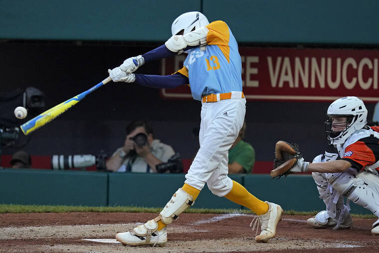 GENE J. PUSKAR / AP Honolulu's Jaron Lancaster connected on a solo home run off Massapequa, N.Y.'s Danny Fregara, during the third inning of the Little League World Series in South Williamsport, Pa., on Friday.