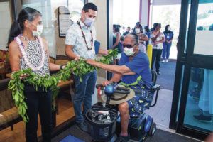 CRAIG T. KOJIMA / CKOJIMA@STARADVERTISER.COM
                                Cheryl Soloman and Medical Director Arie Ganz greeted patient Mabel Maria with maile lei Tuesday after opening ceremonies at the Waianae Coast Nanakuli Dialysis Clinic.