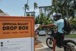 JAMM AQUINO / JAQUINO@STARADVERTISER.COM
                                Derek Anderson rode up on his electric motorcycle to deposit his ballot in a drop box on Friday at Honolulu Hale.