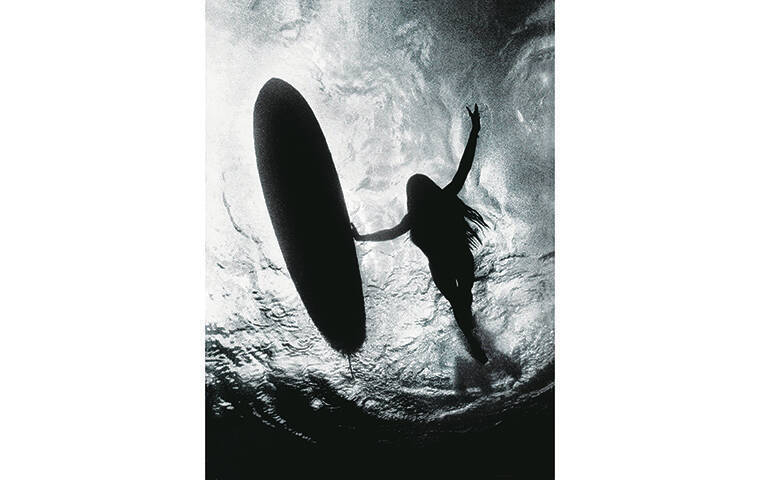 STAR-ADVERTISER 
                                Rell Sunn took to the sea with her surfboard in 1983. This photo was shot by former Star-Advertiser photographr Dennis Oda and he considered it one of his favorites. Everytime they met, Oda said he “always left feeling a little better” because of the person that Sunn was.