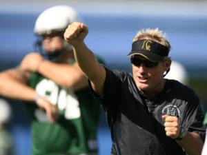 JAMM AQUINO / 2006
                                Defensive line coach Jeff Reinebold gives instructions during practice on Aug. 5, 2006.