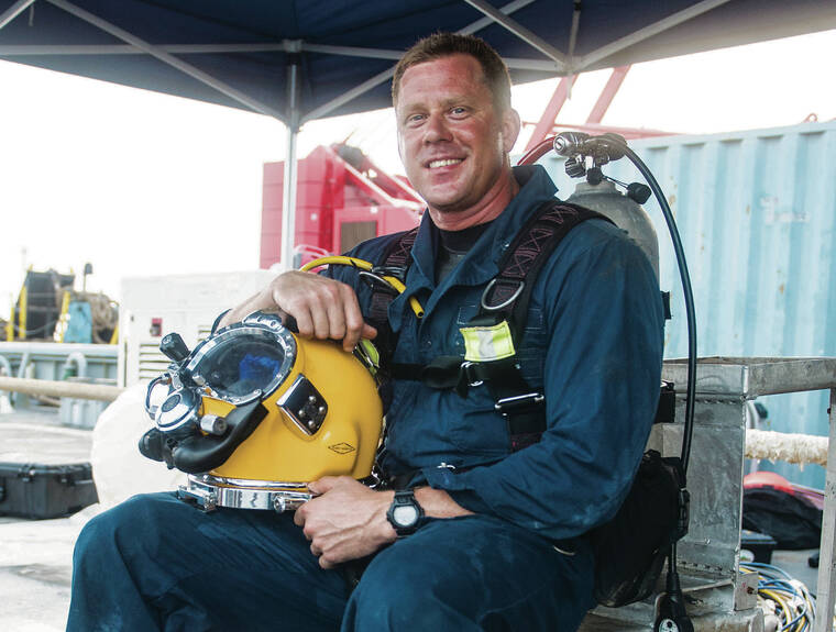 COURTESY U.S. NAVY
                                The divers juggled the mission while wondering how the spill was affecting their own lives. Now-retired Senior Chief Master Diver Brian Simic, 40, said that his family became seriously ill from fuel exposure.