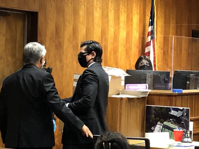 STAR-ADVERTISER
                                Casey Y. Asato, 41, was taken into custody Thursday after a guilty verdict on all counts of first-degree arson, place to keep a pistol, six counts of terroristic threatening and reckless endangering. His attorney, Michael Park, is on the left.