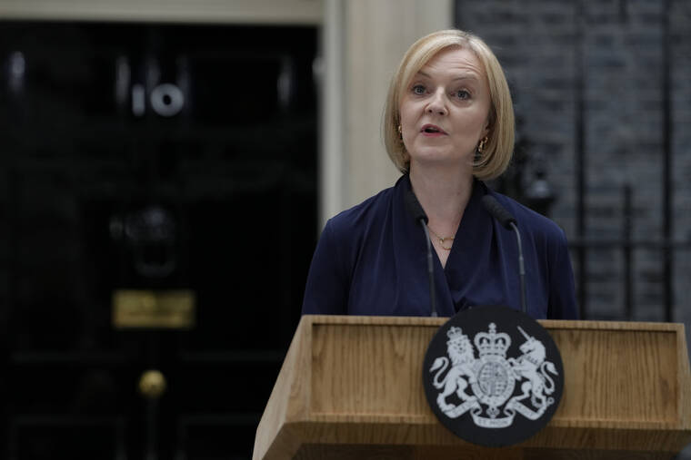 ASSOCIATED PRESS
                                New British Prime Minister Liz Truss makes an address outside Downing Street in London, today, after returning from Balmoral in Scotland where she was formally appointed by Britain’s Queen Elizabeth II.