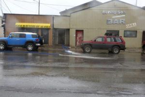 ASSOCIATED PRESS / SEPT. 17
                                Hoses pump water out the front door of the Bering Sea Bar Grill in Nome, Alaska, after the city was flooded when a severe storm hit the community. Just hours after this photo was made, the bar and grill situated just a half block from the Bering Sea burned to the ground. Interim city manager Bryant Hammond said the cause of the fire and whether it was related to the storm were not immediately known.