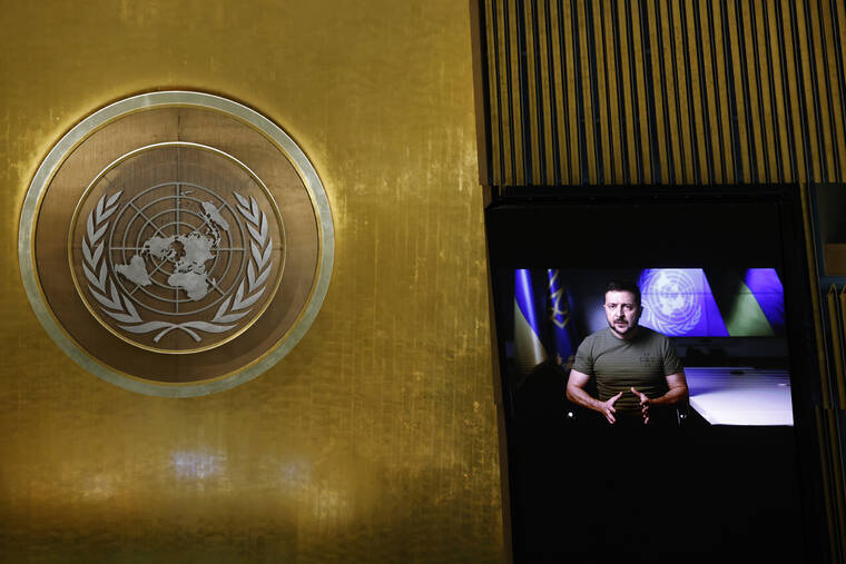 JASON DECROW / AP
                                Ukrainian President Volodymyr Zelenskyy from video addresses the 77th session of the United Nations General Assembly, at U.N. headquarters, Wednesday, Sept. 21.