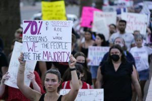 ASSOCIATED PRESS / JUNE 24
                                Protesters march around the Arizona Capitol in Phoenix after the Supreme Court decision to overturn Roe v. Wade, Friday, June 24.