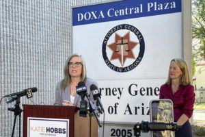 ASSOCIATED PRESS
                                Arizona Secretary of State Latie Hobbs, left, the Democratic nominee for governor, and Kris Mayes, a Democrat running for attorney general, speak to reporters outside the Arizona Attorney General’s Office in Phoenix today.