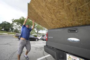 ASSOCIATED PRESS
                                Jesus Rodrigues loads wood in his vehicle outside a Home Depot store in preparation for the arrival of Hurricane Ian, Monday in Orlando, Fla. Ian was growing stronger and on a track to hit the west coast of Florida as a major hurricane as early as Wednesday. (AP Photo/Phelan M. Ebenhack)