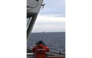 U.S. COAST GUARD DISTRICT 17 VIA ASSOCIATED PRESS
                                A Coast Guard Cutter Kimball crew-member observes a foreign vessel in the Bering Sea, Sept. 19. The U.S. Coast Guard cutter on routine patrol in the Bering Sea came across the guided missile cruiser from the People’s Republic of China, officials said Monday.