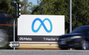 ASSOCIATED PRESS / OCT. 28
                                A car passes Facebook’s new Meta logo on a sign at the company headquarters on Oct. 28, in Menlo Park, Calif.