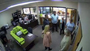 COFFEE COUNTY, GEORGIA / AP
                                This Jan. 7, 2021, image taken from Coffee County, Ga., security video, appears to show Cathy Latham (center, long turquoise top), introducing members of a computer forensic team to local election officials. Latham was the county Republican Party chair at the time. The computer forensics team was at the county elections office in Douglas, Ga., to make copies of voting equipment in an effort that documents show was arranged by attorney Sidney Powell and others allied with then-President Donald Trump.