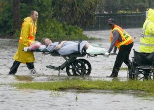 ASSOCIATED PRESS
                                Authorities transport a person out of the Avante nursing home in the aftermath of Hurricane Ian, today, in Orlando, Fla. Hurricane Ian carved a path of destruction across Florida, trapping people in flooded homes, cutting off the only bridge to a barrier island, destroying a historic waterfront pier and knocking out power to 2.5 million people as it dumped rain over a huge area today.