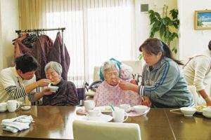 Kentaro Takahashi/The New York Times
                                Nursing home residents being fed at the Chinese restaurant Kaze no Oto in Yokohama.