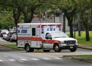 STAR-ADVERTISER / 2006
                                An ambulance rushes towards the Queens Medical Center.