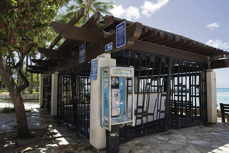 CINDY ELLEN RUSSELL / CRUSSELL@STARADVERTISER.COM
                                Pictured is the dilapidated Kuhio Beach Pavilion No. 4. An increase in crime and homelessness in the area prompted a nonprofit to leave the pavilion.