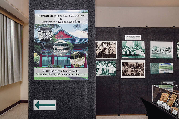 CINDY ELLEN RUSSELL / CRUSSELL@STARADVERTISER.COM
                                The Center for Korean Studies is celebrating its 50th anniversary with an exhibit showcasing historical photographs and other artifacts of Koreans in Hawaii.