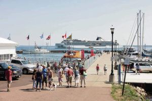 A small Wisconsin port weighs the pros and cons of more cruise ships and their impact on the town