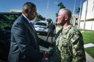 CHAD J. MCNEELEY / DEPARTMENT OF DEFENSE
                                Defense Secretary Lloyd J. Austin III, left, greeted Navy Rear Adm. John Wade, commander of Joint Task Force-Red Hill, on Friday.