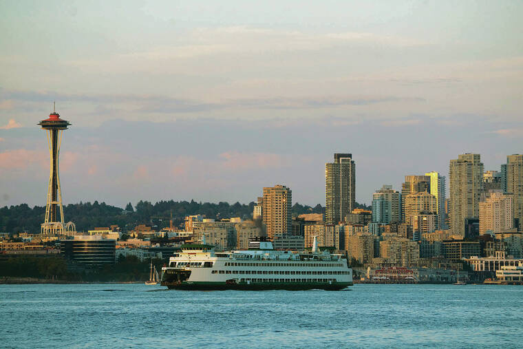 NEW YORK TIMES 
                                With the removal of the elevated highway known as the Alaskan Way Viaduct, the city’s waterfront is undergoing a renewal. Pictured at left is The Space Needle in downtown Seattle.