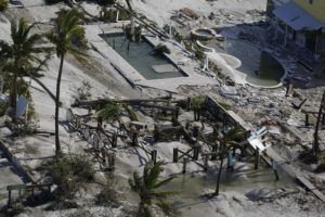 ASSOCIATED PRESS
                                Damaged homes and debris are shown in the wake of Hurricane Ian on Thursday in Fort Myers Beach, Fla.