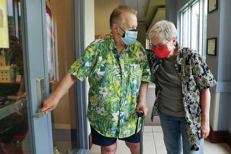 Philadelphia Inquirer / TNS / AUG. 9
                                Suz Atlas, left, and partner Mary Groce in the halls of the John C. Anderson Apartments in Center City, a neighborhood in Philadelphia. The apartment complex opened in 2014 as an LGBTQ-friendly place for seniors to live.