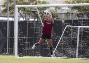 CINDY ELLEN RUSSELL / CRUSSELL@STARADVERTISER.COM
                                Pictured is Lauren Marquez defending against a goal attempt at practice.