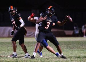 STEVEN ERLER / SPECIAL TO THE STAR-ADVERTISER
                                Campbell Sabers quarterback Jaron Sagapolutele attempted a pass on Aug, 12, 2022.