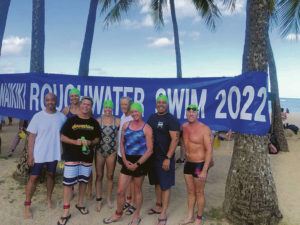 COURTESY RHONDA VANCOONEY
                                Waikiki Roughwater Swim participant Gustavo Penilla got in trouble in the water during the event and was transported to Queen’s Medical Center where he later died. A group shot at the event shows Joe Del Rosario, left, Julie Ruhlin, Tony Gale, Merritt Morris, Anita Correa, Carol Lind Hansen, Penilla and TJ Sutherlin.