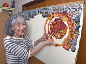 JAPAN NEWS-YOMIURI
                                Eiko Shima happily works on a large collage May 6 in her Setagaya ward home in Tokyo.