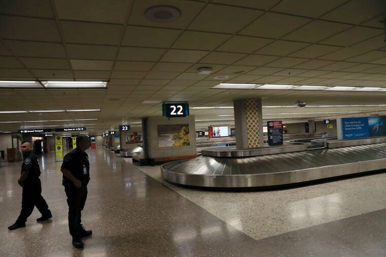 Separate bomb scares disrupt Honolulu airport and Pearl Harbor-Hickam